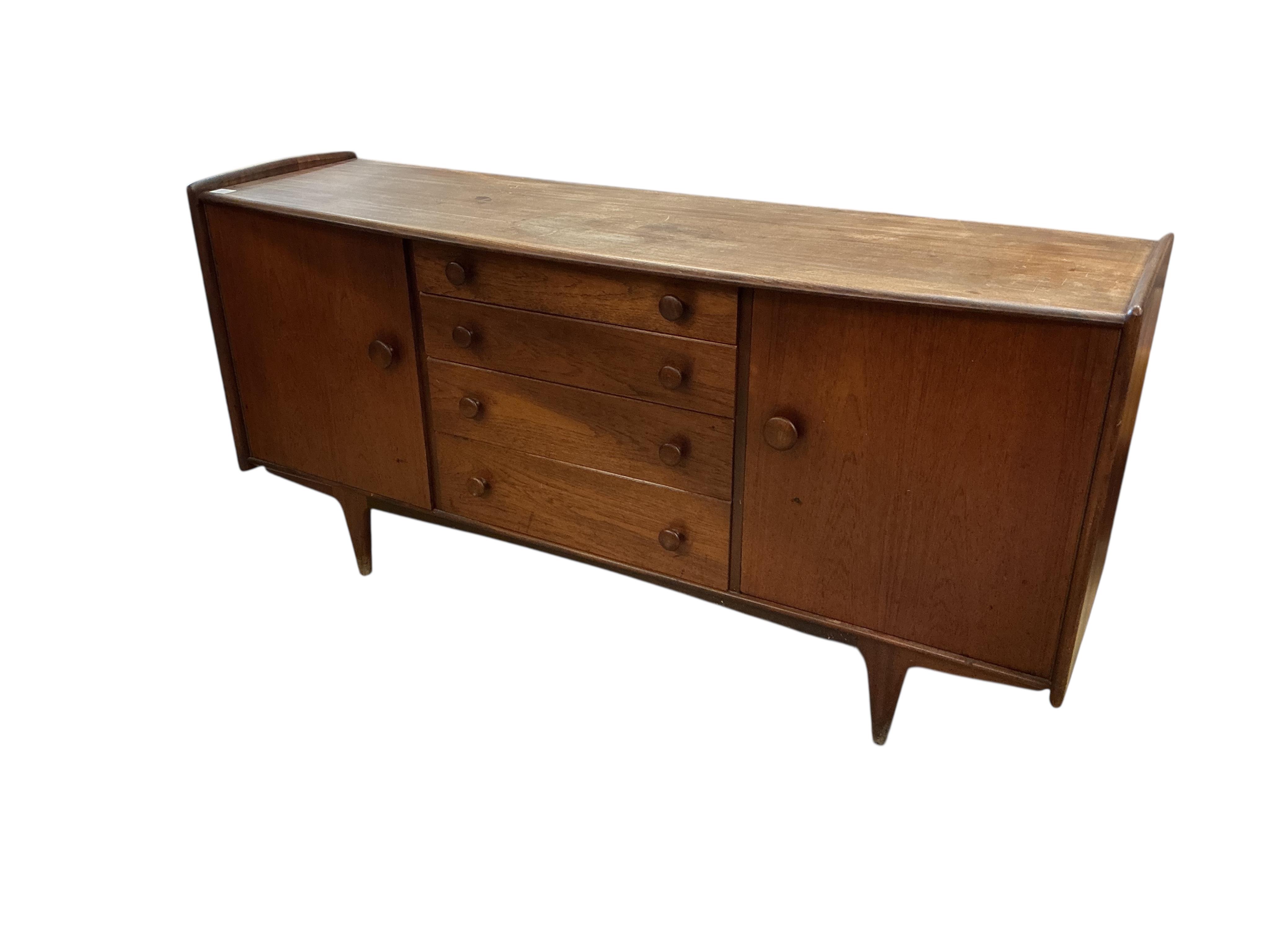 John Herbert for Younger, a mid century 'Volnay' teak bowfront sideboard, width 168cm, depth 49cm, height 82cm